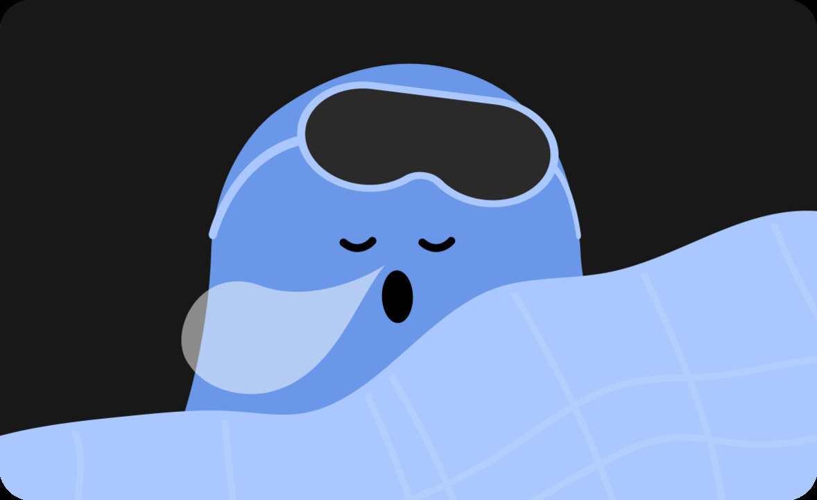 파란색 만화 캐릭터가 안대와 담요를 덮고 자는 모습